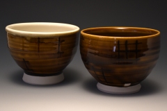 amber teabowls with aperture motifs with underglaze