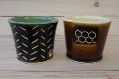 carved tea cups: hand thrown porcelain, cone 6 oxidation.