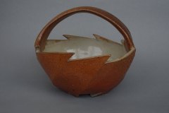 Sawtooth basket: salt/ash exterior, shino interior, wood fired.